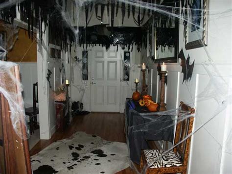 Go to your cupboard, grab some black plastic trash bags & make a large creepy a large black trash bag will make one full size bat with nothing else but a little dab of paint for the eyes. 26 DIY Ideas How to Make Scary Halloween Decorations With ...