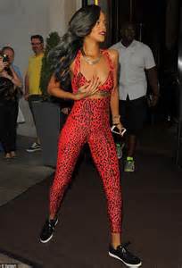 yes this is a man s jacket rihanna bares her taut tummy in masculine wrapper as she goes
