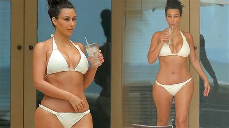 Kim Kardashian Pictured Looking Ice Cool In Sexy White Bikini On Honeymoon With Kanye West