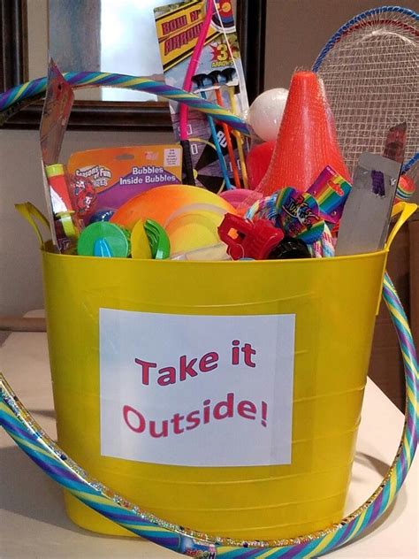 Take It Outside Basket For Silent Auction Filled With Toys And Items