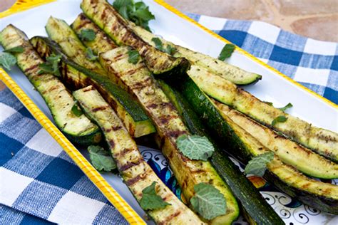 Add zucchini in a single layer and grill until charred on both sides and just beginning to soften, about 2 minutes per side. Grilled Zucchini Wedges With Mint | Recipe Rebuild