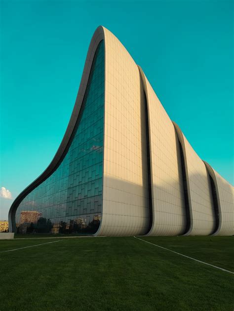 White Concrete Building Under Blue Sky During Daytime Photo Free