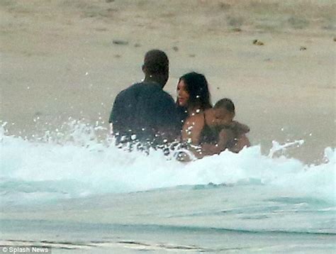 Kim Kardashian On Mexico Beach With Husband Kanye West And Baby North