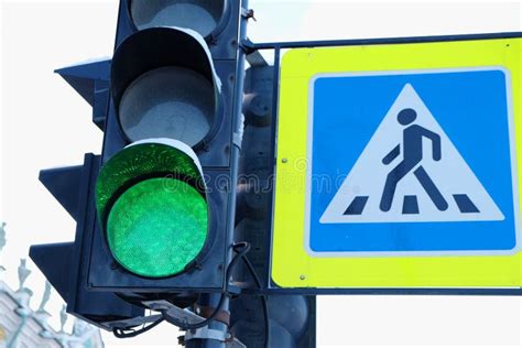 Crosswalk Sign And Traffic Light Stock Image Image Of Showing Green