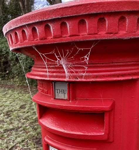 Red British Post Box Or Pillar Box With Frozen Spiders Web Winter