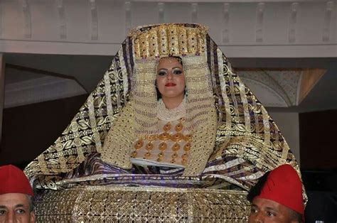 Learn about moroccan clothing with us. Moroccan bride wearing traditional dress | Moroccan bride ...