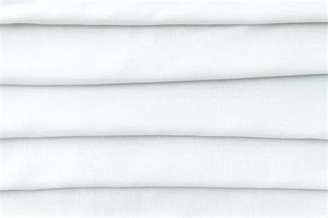 Stack Of Folded White Woven Fabric Patterned Background Free Image By