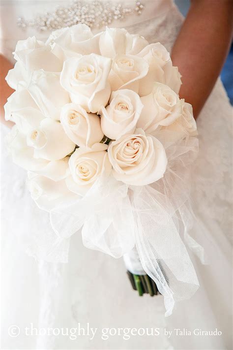 Remember, wildflower bouquets don't just contain flowers, but also grasses, grains and herbs, which add texture and vibrancy. White roses wedding bouquet, clean, elegant and simple ...