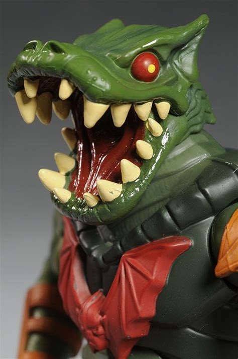 a close up of a toy alligator with its mouth open