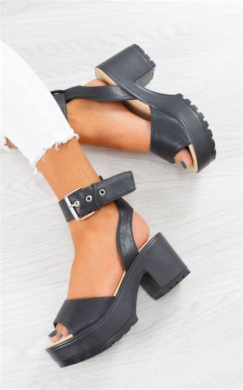 Elegant is the only word to define this pair of heels. Chunky Platform Sandals - Black PU by AJ | VOYAGE ...