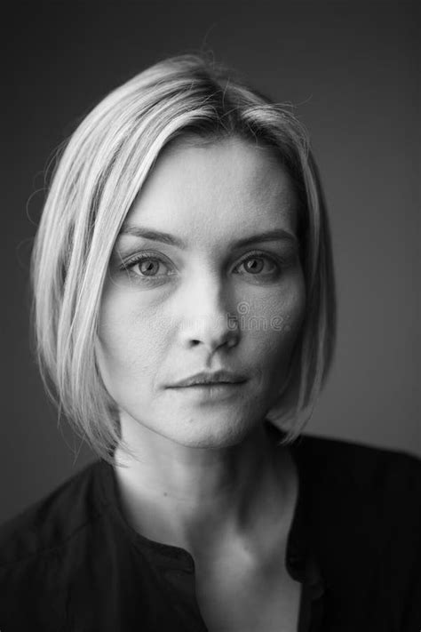 Dramatic Black And White Portrait Of A Beautiful Woman On A Dark