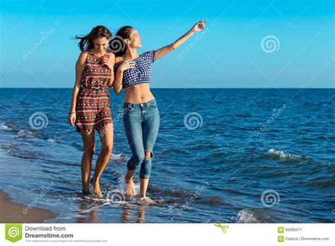 Pretty Girl Has A Fun With Her Girlfriend On The Beach Stock Image Image Of Love Lifestyle