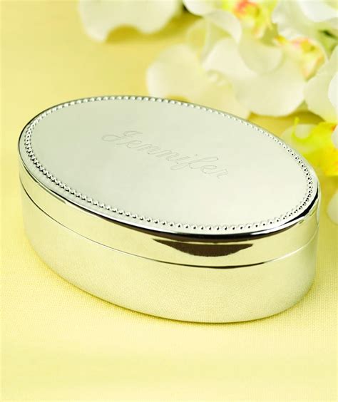 Oval Jewelry Box Made Of Silver Plated Metal With A High Polish Finish