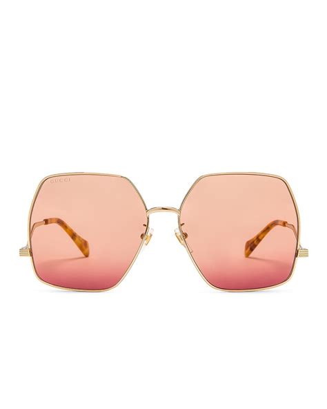 Gucci Wavy Sunglasses In Shiny Endura Gold Fwrd