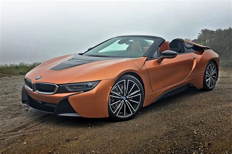 The i8 coupe streaked its way onto the automotive scene for 2015; 2019 BMW i8 Roadster Review: Impressively Distinctive | Automobile Magazine