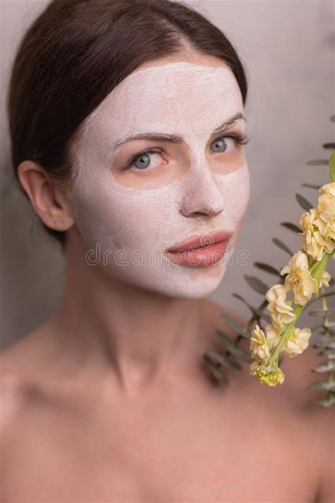 Spa Woman Applying Facial Clay Mask Beauty Treatments Stock Image