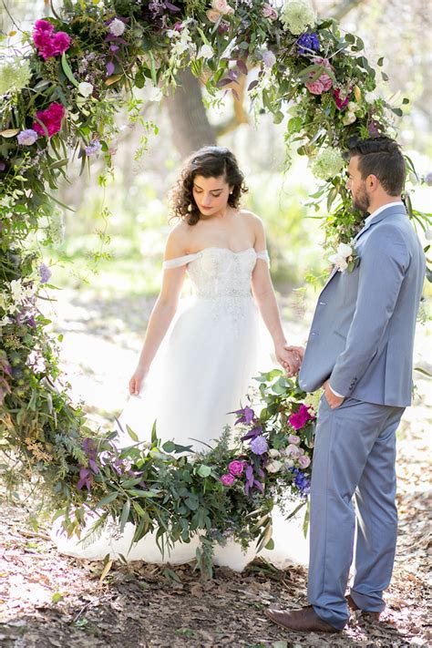 A wedding vow renewal is a ceremony in which a married couple renews or reaffirms their wedding vows. Outdoor Vows + A Giant Floral Wedding Ceremony Wreath {Nicola Bester Photography}