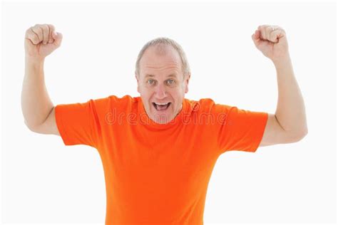 Mature Man In Orange Tshirt Cheering Stock Photo Image Of Camera