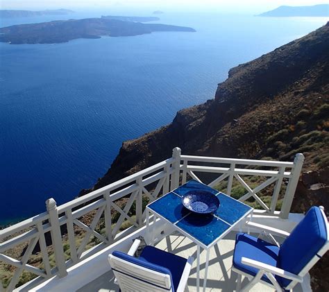 Iconic Santorini Greece With French Doors Opening Onto A Private