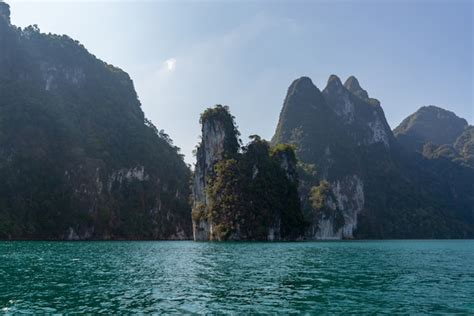 Premium Photo Limestone Mountains With Trees In The Sea In Thailand