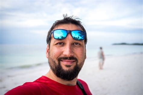 Premium Photo Adult Man Taking Selfie On Tropical Beach