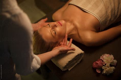 Woman Undergoing A Head Massage By Stocksy Contributor Lumina Stocksy