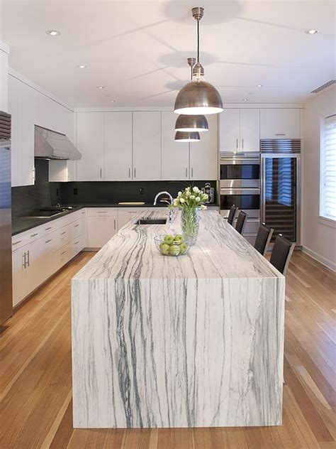 This clean edge beautifully complements both residential and commercial applications. 39 Trendy And Chic Waterfall Countertop Ideas - DigsDigs