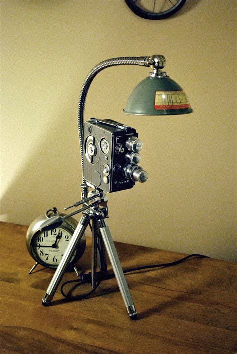 Practical lighting is a light source that is visible within the scene like lamps, light fixtures, candles, and television sets. Vintage NIZO 8mm movie camera Desk light (With images ...