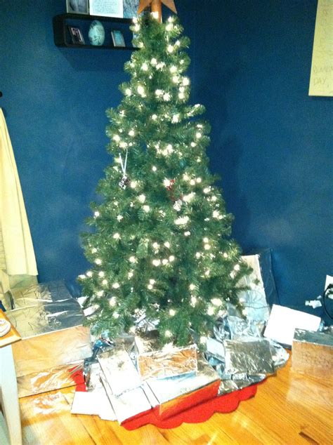 A Cat Proof Christmas Aluminum Foil Tree Skirt And Foil Wrapped