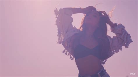 Ariana Grande Gets Tangled Up In A Dangerous Love Triangle In The ‘into