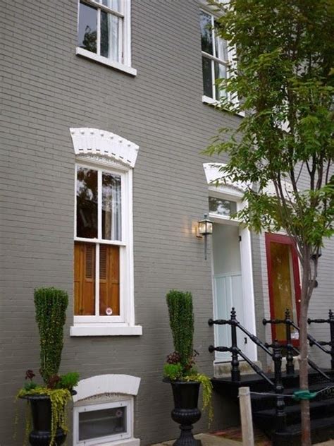 Charcoal greys come in a wide range of tones and saturations, from near black to medium grey with twilight. gray painted brick house | House Update | Pinterest