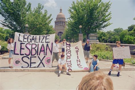 [front view of lesbian avengers members holding signs at texas capitol] the portal to texas