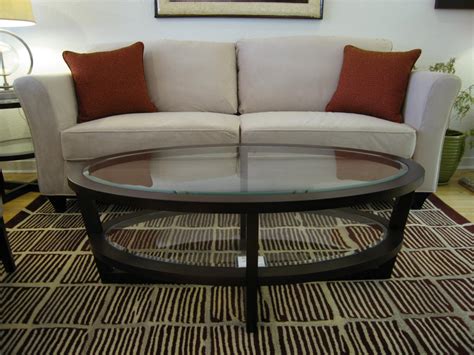 An oval coffee table with a glass top will keep the room feeling light and airy, while those made of thick slabs of marble or concrete will command more attention. Living Room Design: Amazing Oval Coffee Table For Home ...