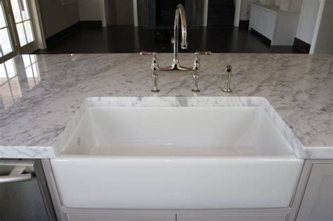 Install two lengths of 2×4's front to back in the cabinet base. Farm Sink Installation Instructions | Farmhouse Sinks ...