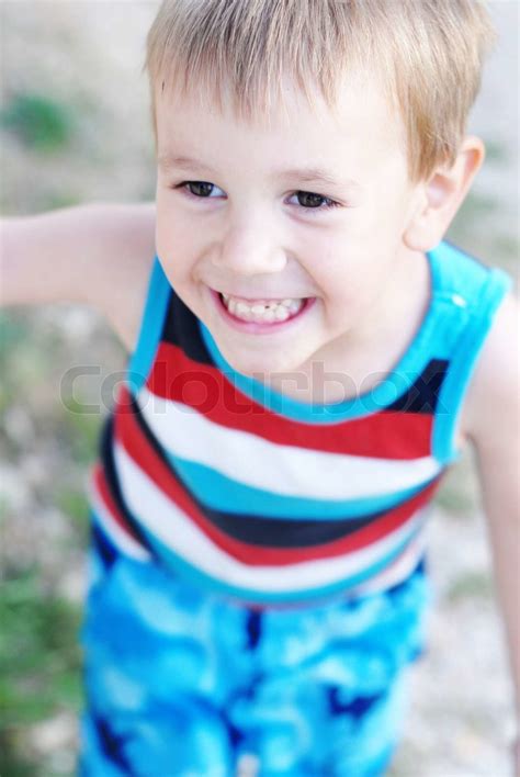Portrait Of Cute Little Boy Smiling Stock Image Colourbox