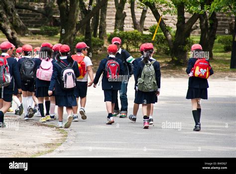 A Group Of Japanese School Children On An Outing Field Trip In