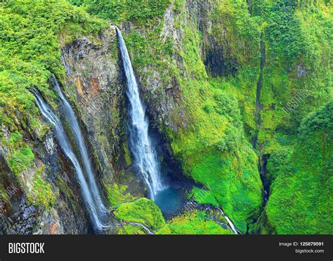 Aerial View To Waterfall In Tropical Rainforest Cirque Salazie Is