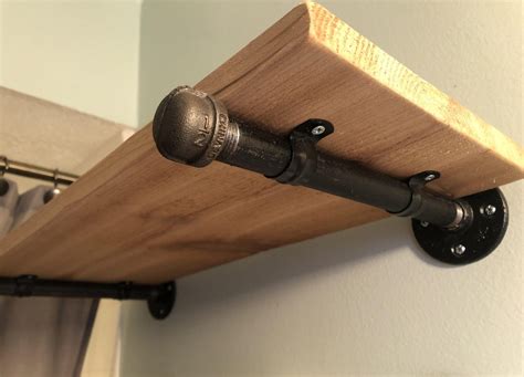 Most of the items needed to build the pipe wall supports can be found in the gas/plumbing section of the store. Gas Pipe and Cedar Wood Shelf | Pistol Pete's
