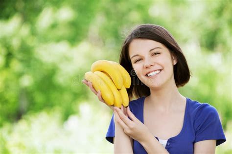 Closeup Portrait Happy Young Woman Holding Bananas Stock Photos Free