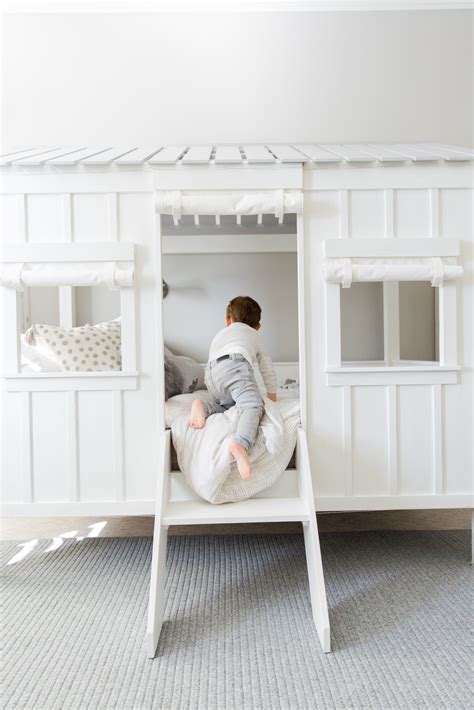 Handcrafted wooden bunk beds in this montana log cabin looks like something out of a fairytale. Modern Nautical Big Kids Room Reveal - Project Nursery