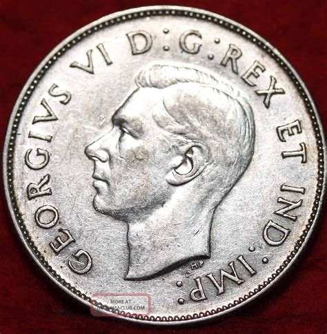 Mistakes do happen, and some get past quality control. 1947 Canada Silver Fifty Cents Foreign Coin S/h