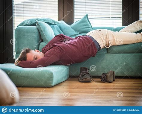 Drunk Man Resting On Couch With Head On The Floor Stock Image Image