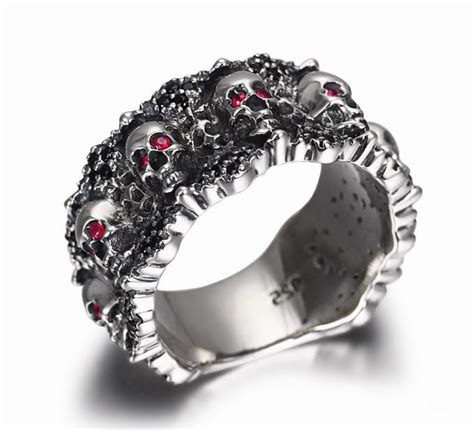 Eyes Of Five Elements Sterling Silver Carved Skulls Ring With Ruby
