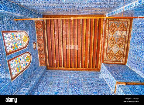 cairo egypt december 22 2017 the wooden ceiling and blue tile walls of ibrahim agha
