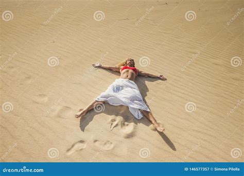 Beautiful Caucasian Woman Enjoying Summer Holiday Vacation Travel Lay Down At The Beach On The