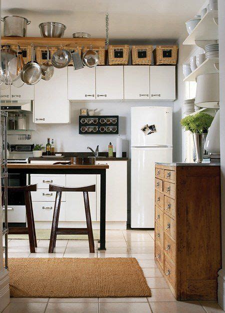 Empty space above your cabinets can make your kitchen look unfinished but too much many times a bookcase or cabinet or the kitchen cabinetry feels way too squatty in a room. Small Kitchen Storage: Put Baskets Above the Cabinets ...