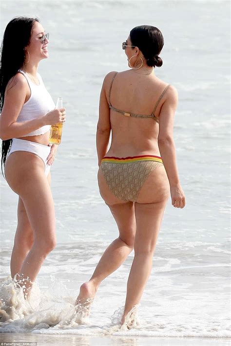 Kim Kardashian Busts Out Of Her Skimpy Bikini Daily Mail Online