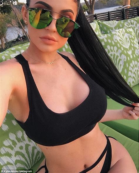 Kylie Jenner Puts On A Busty Display In Tiny Black Bikini Daily Mail