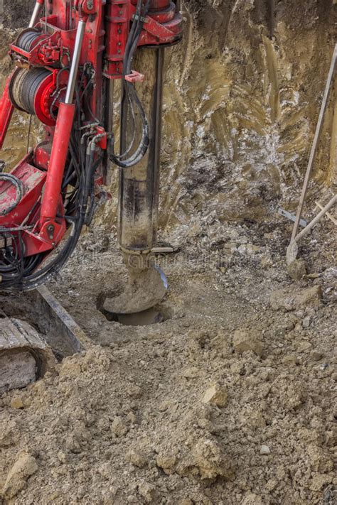 Drilling Hole In Ground With Ground Hole Drilling Machine Stock Image