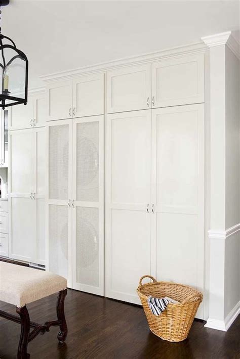 Boot room accessories & furniture. TerraCotta Properties: Amazing hidden laundry room in ...